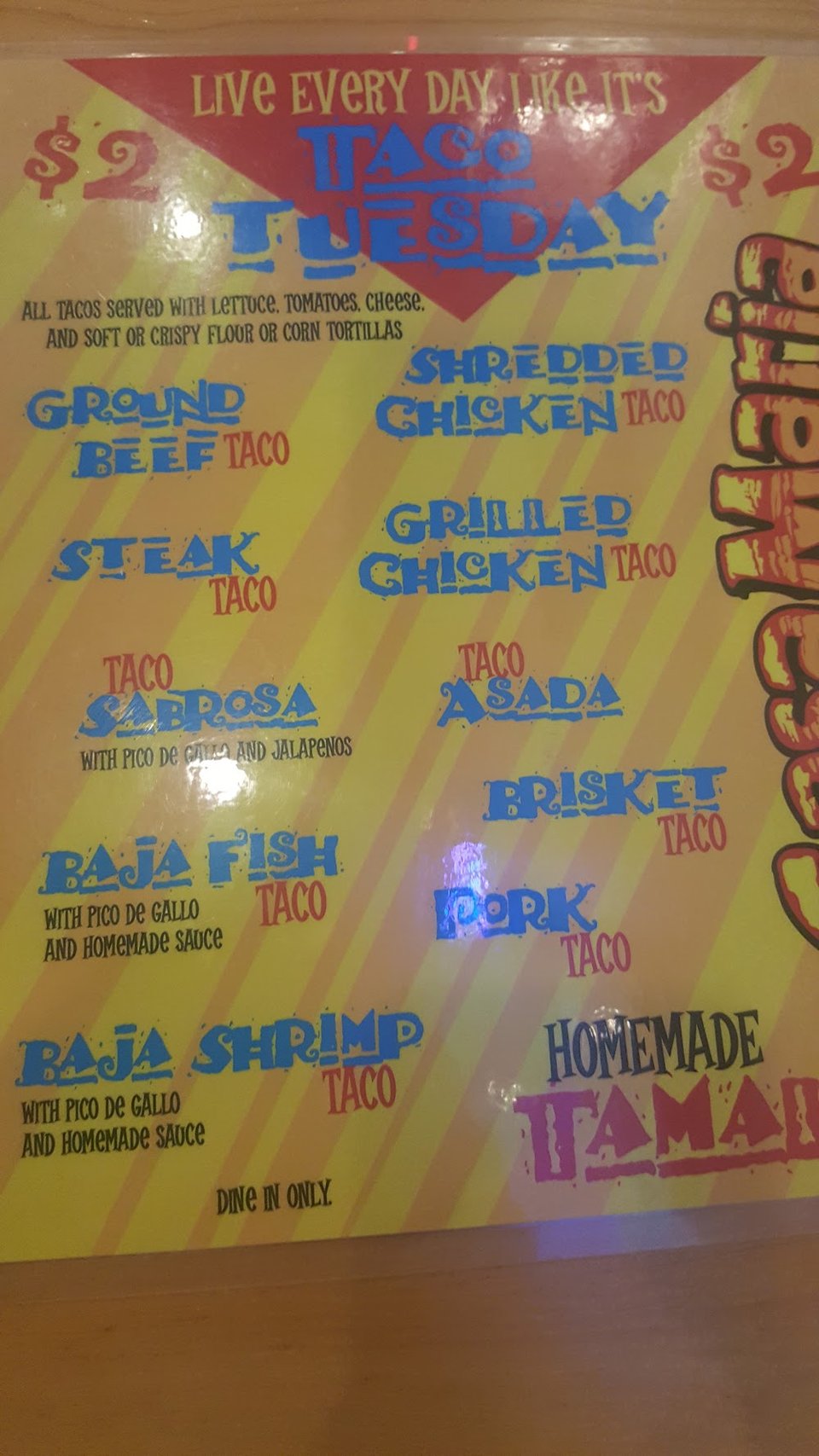 Menu page listing burritos and chimichangas.